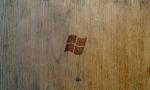Windows logo on half grey oak wood